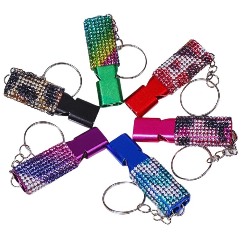 Elegante llavero con silbato de seguridad para mujer
